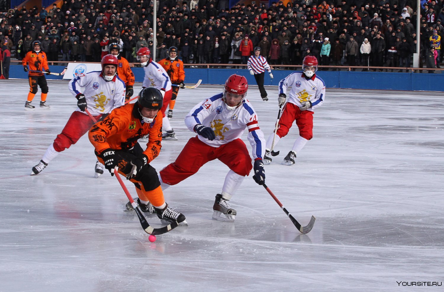 Командная игра на льду. Лед хоккей. Шайба для хоккея. Игра" хоккей". Хоккей вид спорта.