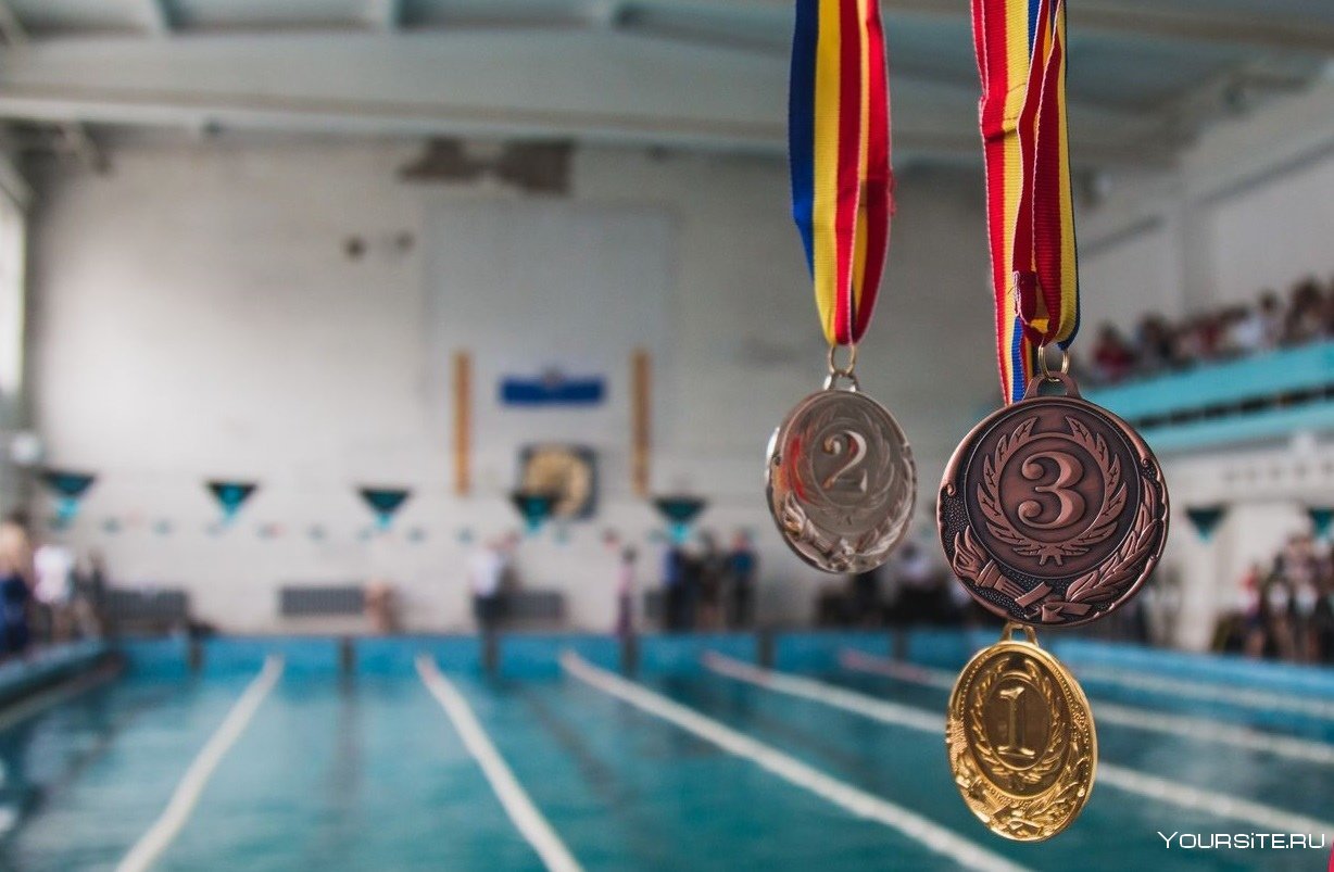 Проект спортивные достижения. Медаль по плаванию. Олимпийская медаль по плаванию. Спортивные медали по плаванию. Спортивные награды.